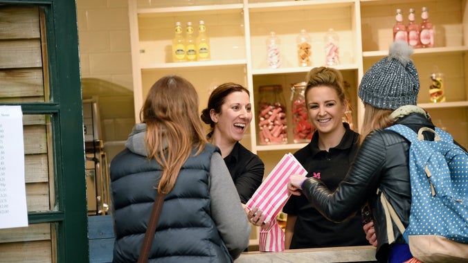 Serving visitors at the kiosk